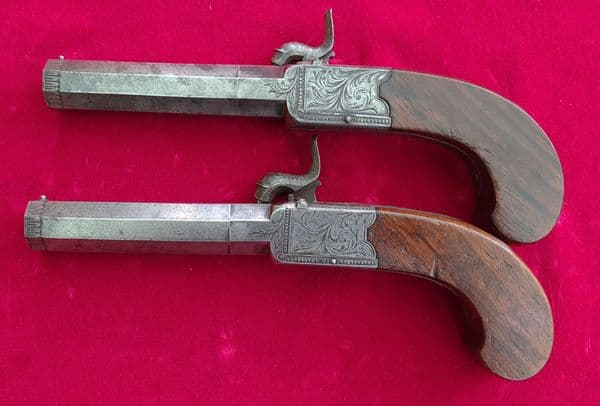 A fine pair of English .50 cal percussion pocket pistols by Henderson of Aberdeen. C. 1830. Ref 3215